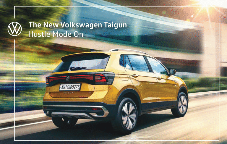 Volkswagen Taigun Delhi golden yellow compact SUV driving on road with motion blur background